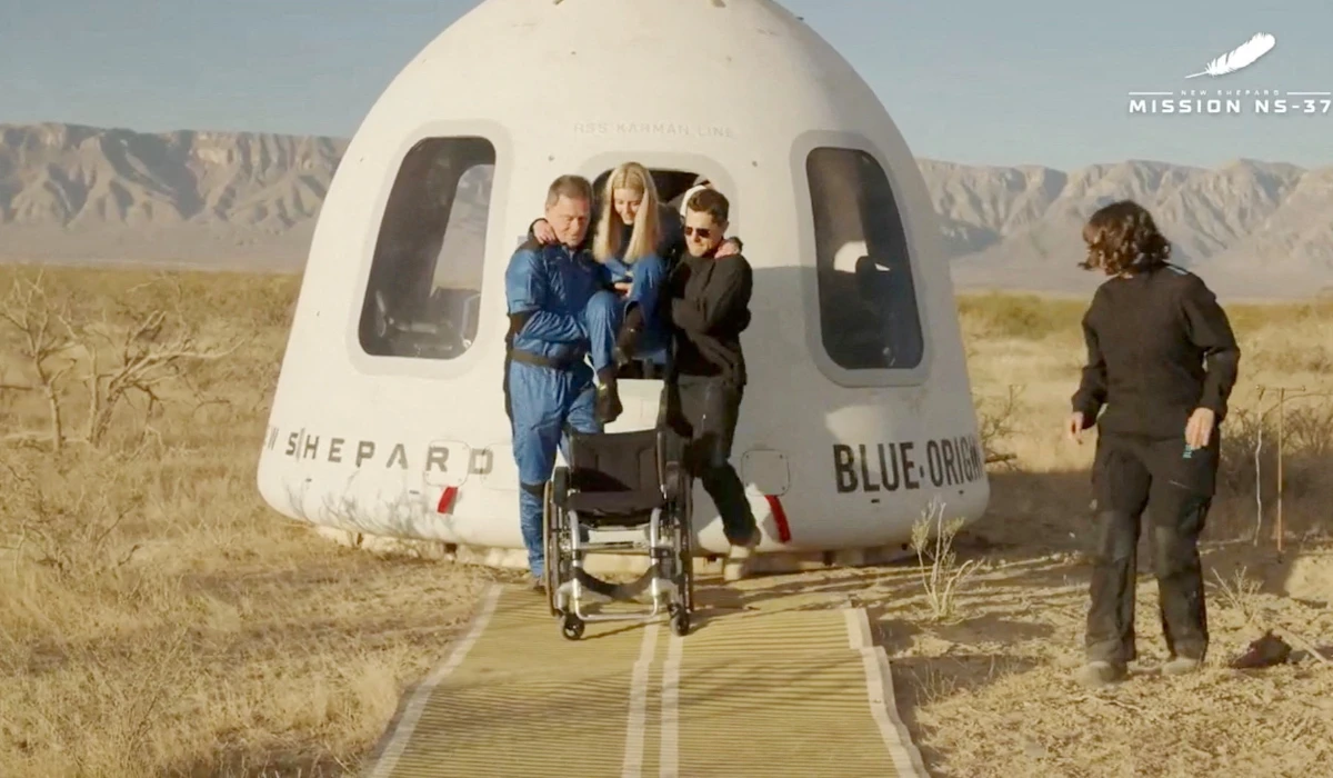 European Space Agency (ESA) engineer Michaela "Michi" Benthaus is carried to a wheelchair from the capsule door of a Blue Origin New Shepard rocket after landing in Van Horn, Texas, U.S. December 20, 2025 in a still image from video. (REUTERS)
