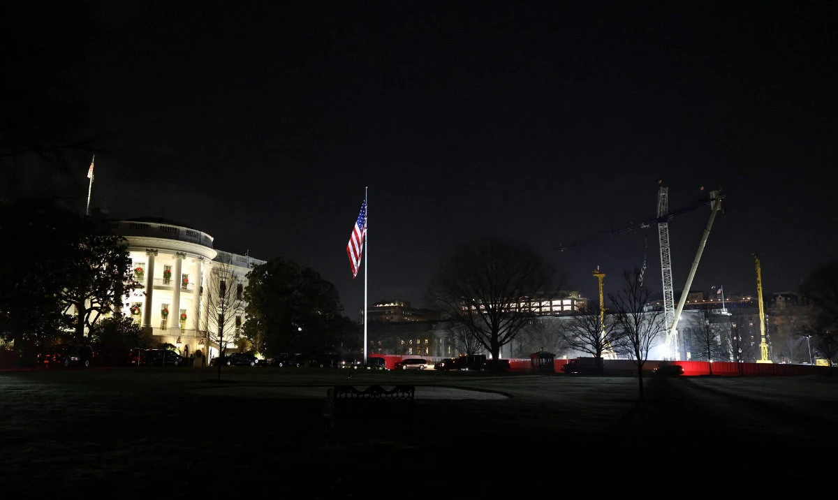 The construction site of US President Donald Trump’s proposed ballroom is lit up as work continues late into the night at the White House in Washington, DC, US, December 6, 2025. (Reuters)