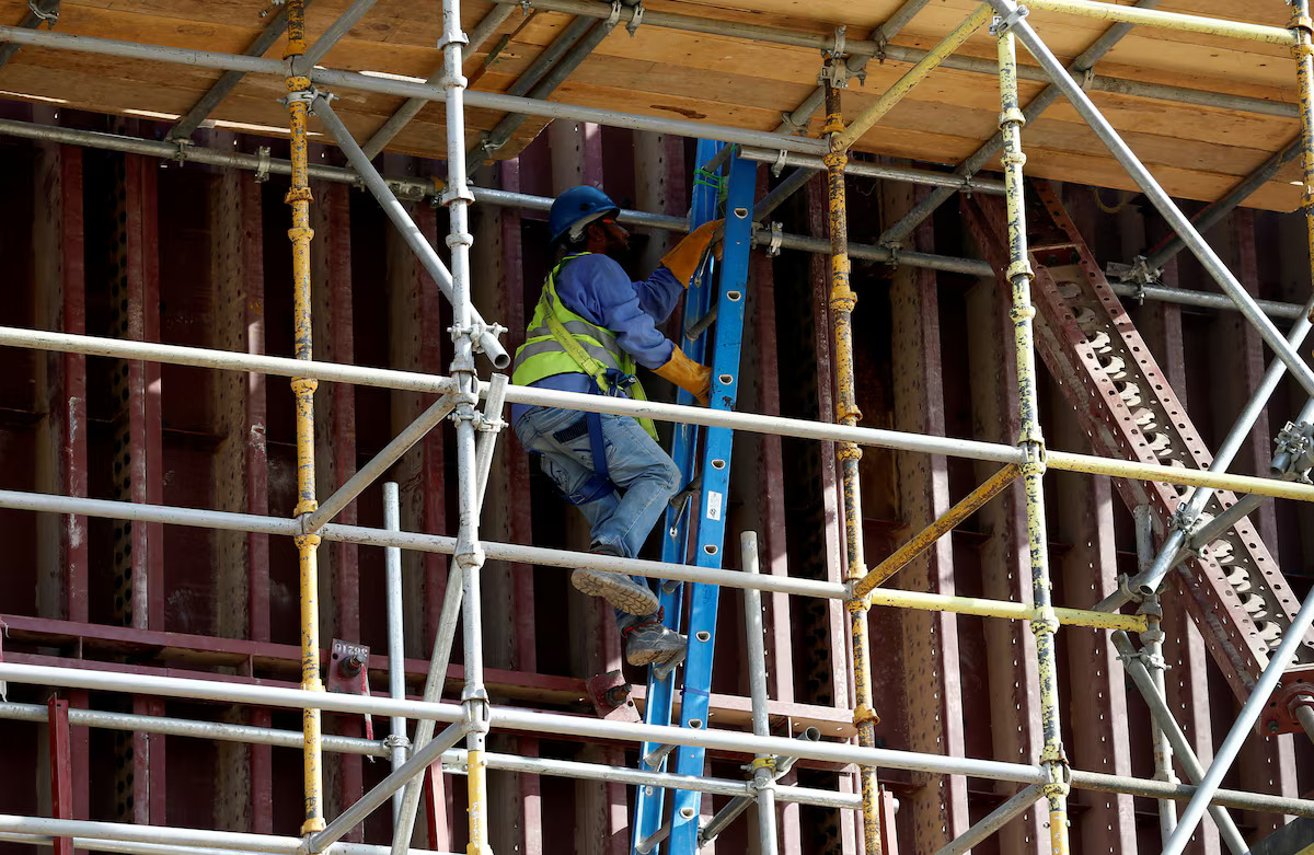 In this file photo, a foreign worker climbs a ladder at the construction site of a building in Riyadh, Saudi Arabia on Aug. 4, 2016. (Reuters)