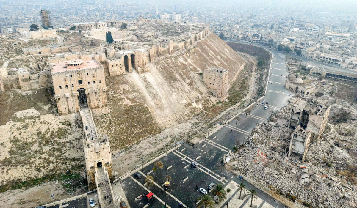 This aerial view shows the Citadel of Aleppo overlooking the northern Syrian city on December 11, 2024. (AFP)