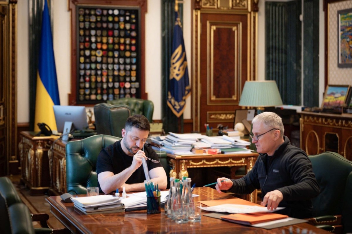 A handout photograph released by the Ukrainian Presidential Press Service shows head of the Foreign Intelligence Service Oleg Ivashchenko meeting with Ukraine's President Volodymyr Zelensky in Kyiv.