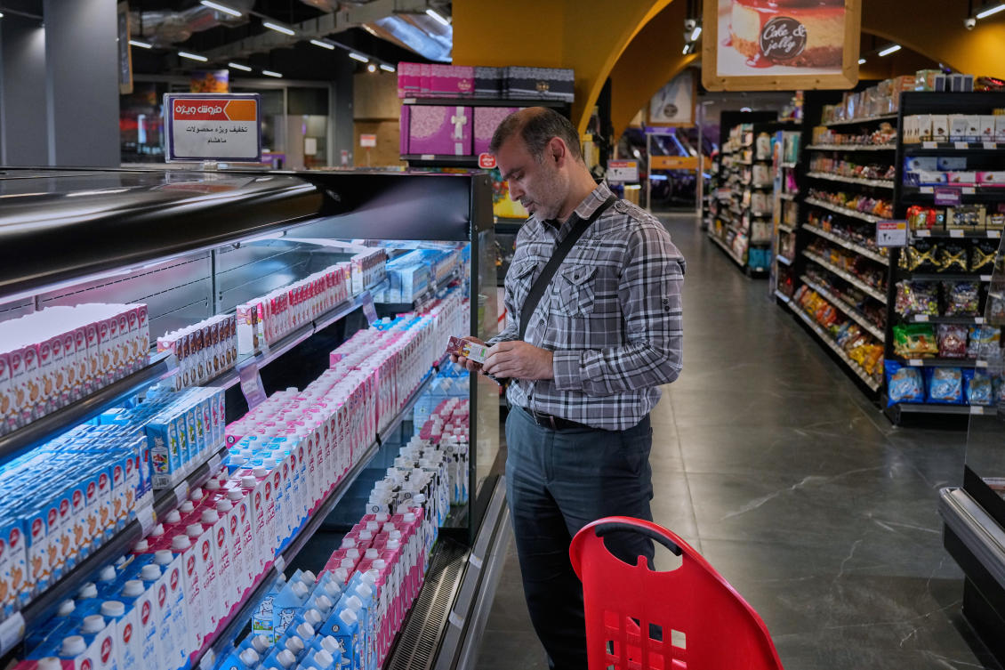 A customer shops at a supermarket at a shopping mall in northern Tehran, on Sept. 28, 2025. (File/AP)