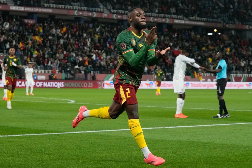 Cameroon's Junior Tchamadeu celebrates after he scored the opening goal during the Africa Cup of Nations round of 16 soccer match between South Africa and Cameroon in Rabat. (AP)
