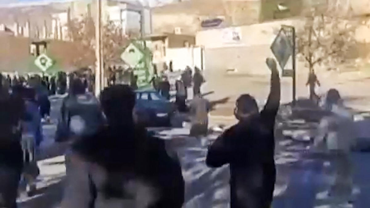 This video grab taken on January 4, 2026, from UGC images published on January 3, 2026, show protesters in the Malekshahi district of Iran's western Ilam province. (AFP)