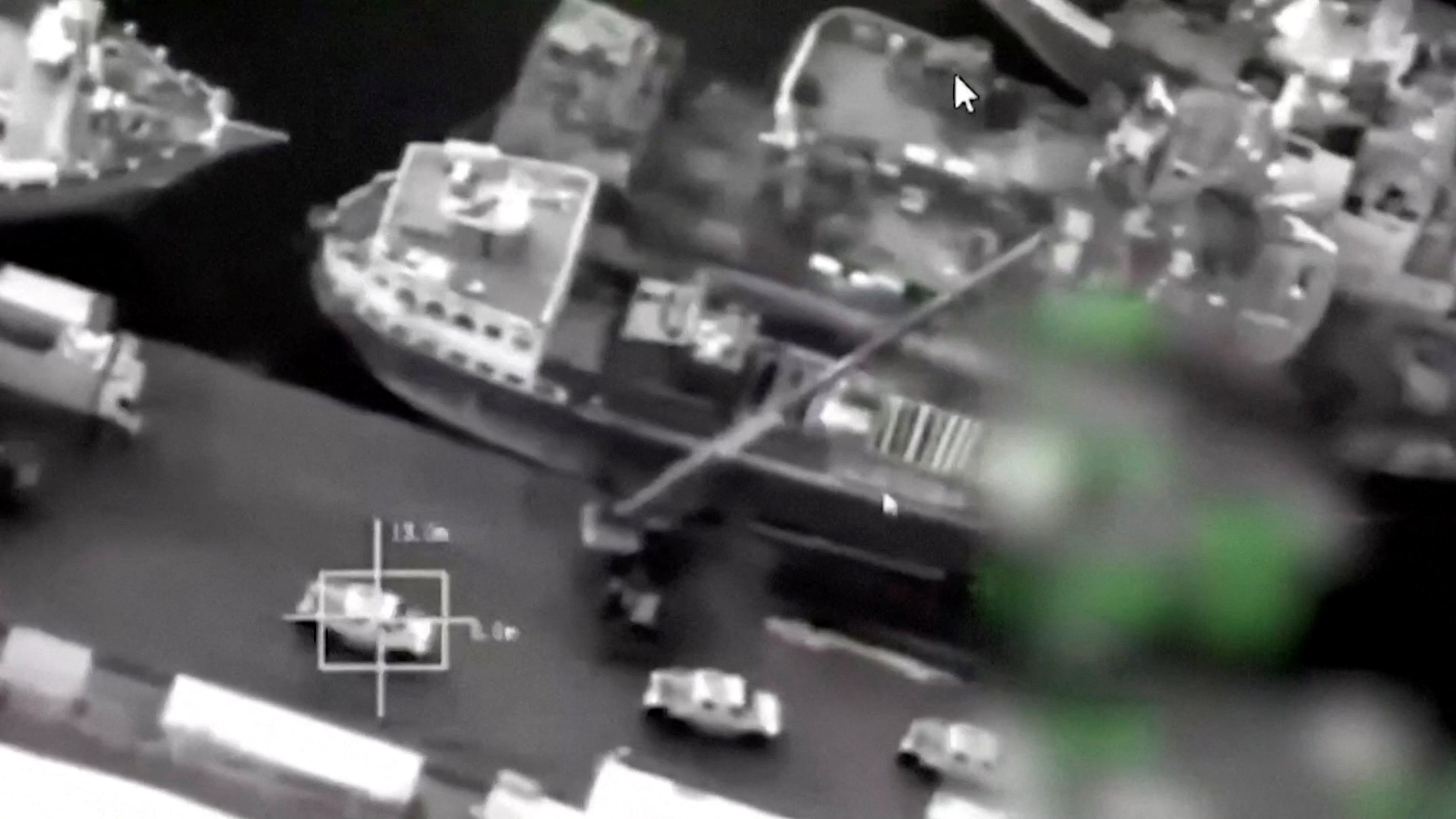 Footage released by an Arab military coalition supporting Yemen's government shows the unloading of military vehicles at Mukalla Port after arriving from the UAE. (Coalition/Handout)
