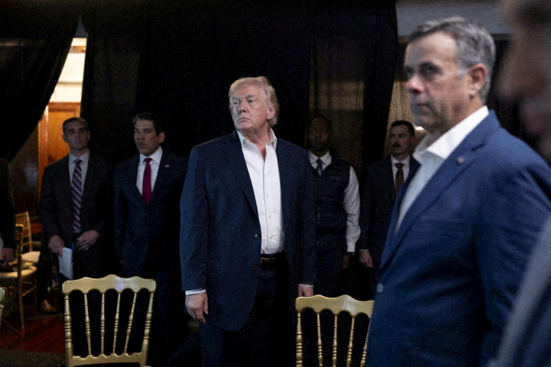 Trump stands near CIA Director John Ratcliffe as they watch the US military operation in Venezuela on January 3. (Via Reuters)