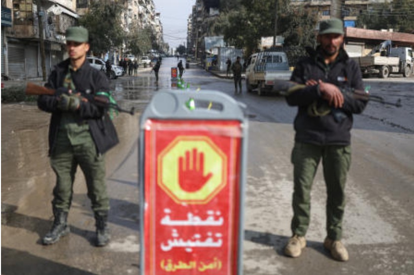 Syrian government forces deploy on the streets as they take over the Achrafieh neighborhood from Kurdish fighters after three days of clashes in a contested area of the northern city of Aleppo, Jan. 9, 2026. (AP)