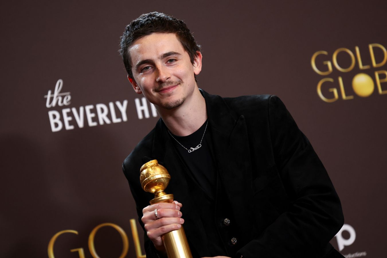 Timothee Chalamet triumphed in one of the most competitive categories, taking the trophy for best male actor in a movie musical or comedy for his role as a professional table tennis player in “Marty Supreme.” (Supplied)