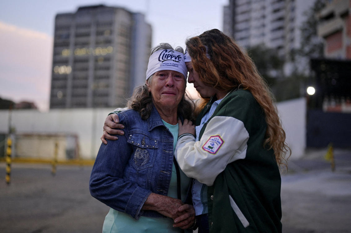 Family members outside National Police Zone 7 Detention Centre as Venezuela's government begins releasing some detainees, in Caracas, Venezuela, January 12, 2026. (Reuters)