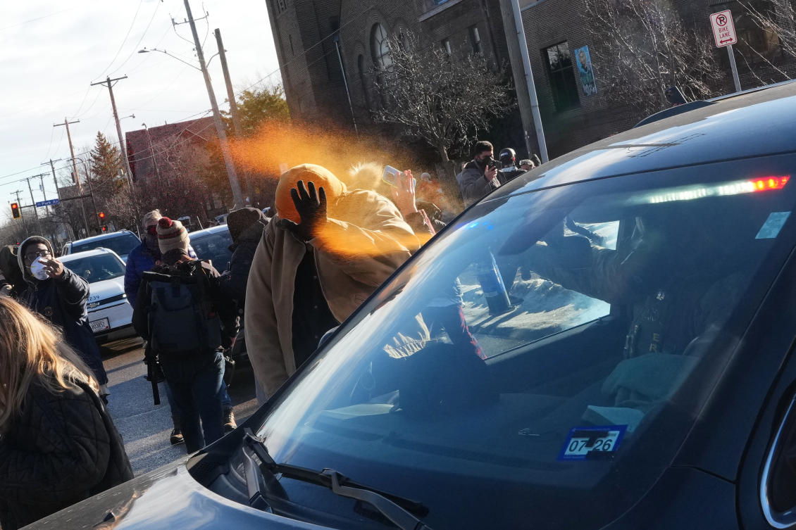 A protester is sprayed with pepper spray by a Federal agent in Minneapolis, Minnesota, Tuesday, Jan. 13, 2026. (AP Photo)