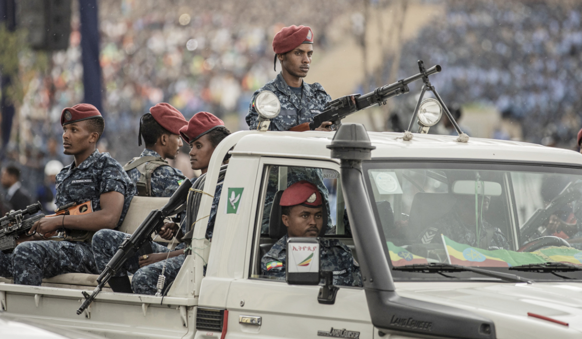 An Ethiopian Federal Police officers pass by during a ceremony of honoring members of the Federal Police Force in Addis Ababa, Ethiopia, on June 5, 2022. (AFP)