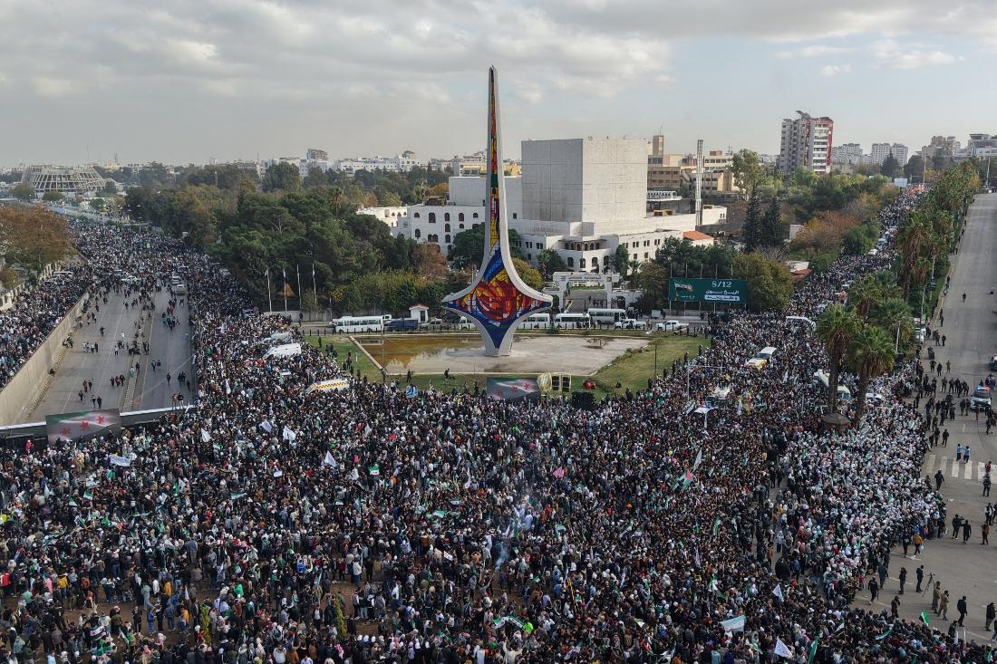 Thousands celebrated on Dec. 8 as they marked the overthrow of the Assad regime. (File/AFP)