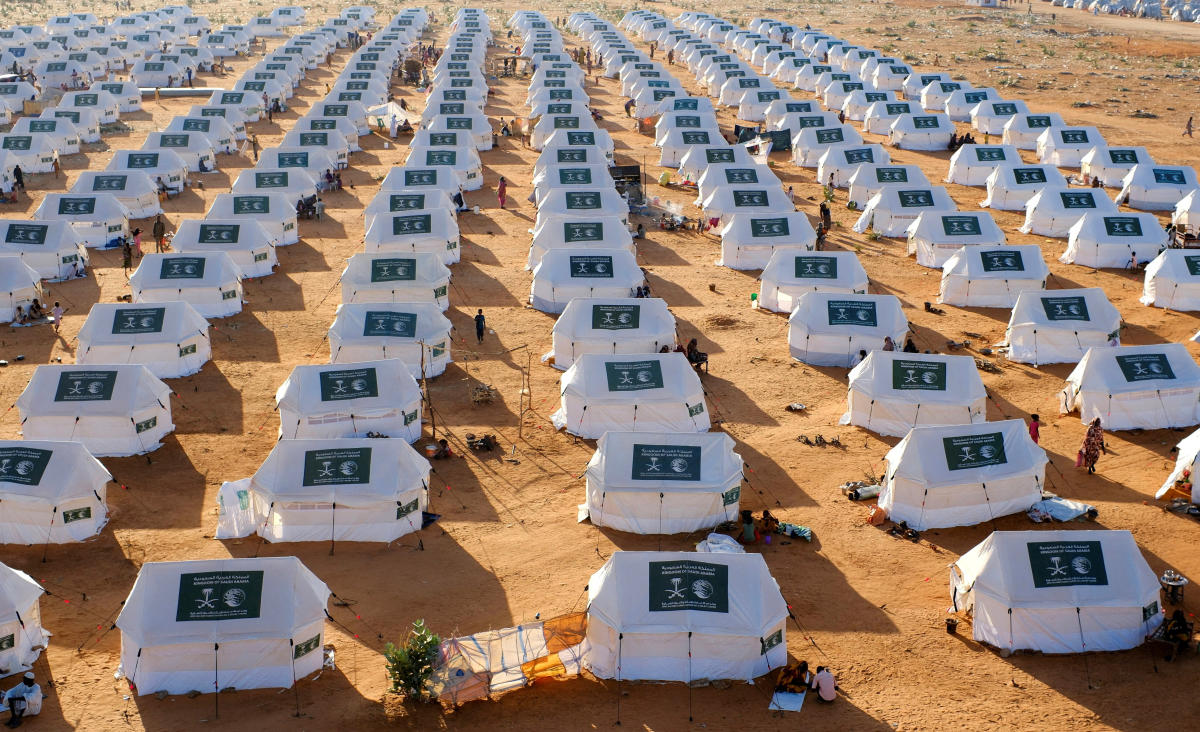 Tents display the logo of the Kingdom of Saudi Arabia at a displaced persons camp in El Obeid, North Kordofan State, Sudan, on Monday. (Reuters)