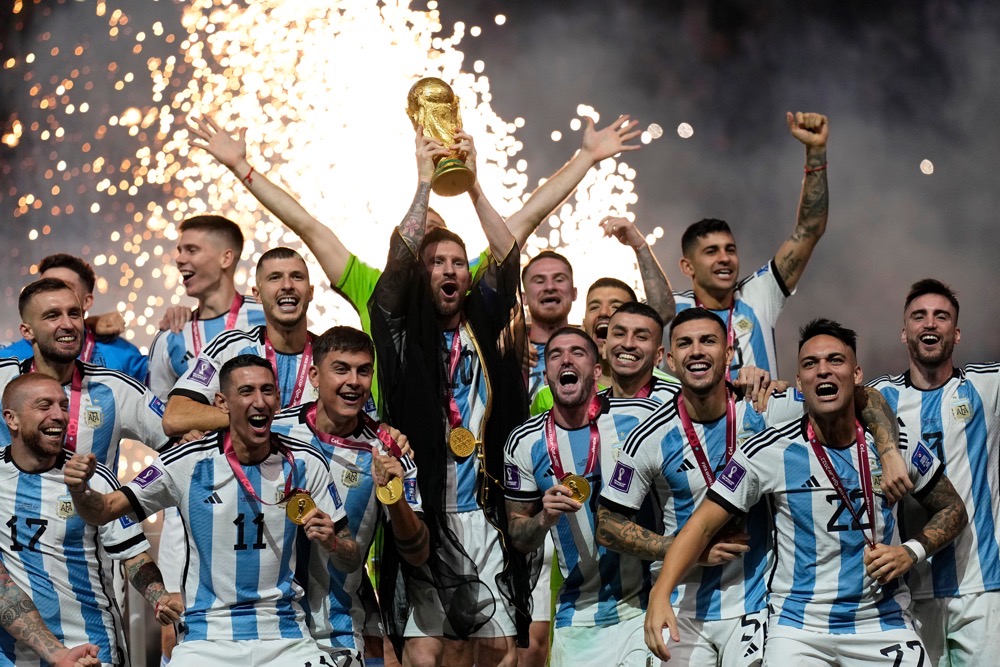 Argentina’s Lionel Messi lifts the trophy after winning the World Cup final soccer match between Argentina and France at the Lusail Stadium in Lusail, Qatar, on Dec. 18, 2022. (AP/File)
