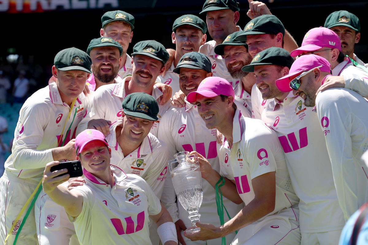 Australia’s captain Steve Smith (2nd L) takes a selfie with team mates as they celebrate with the Waterford Crystal Ashes Trophy. (FILE/AFP)