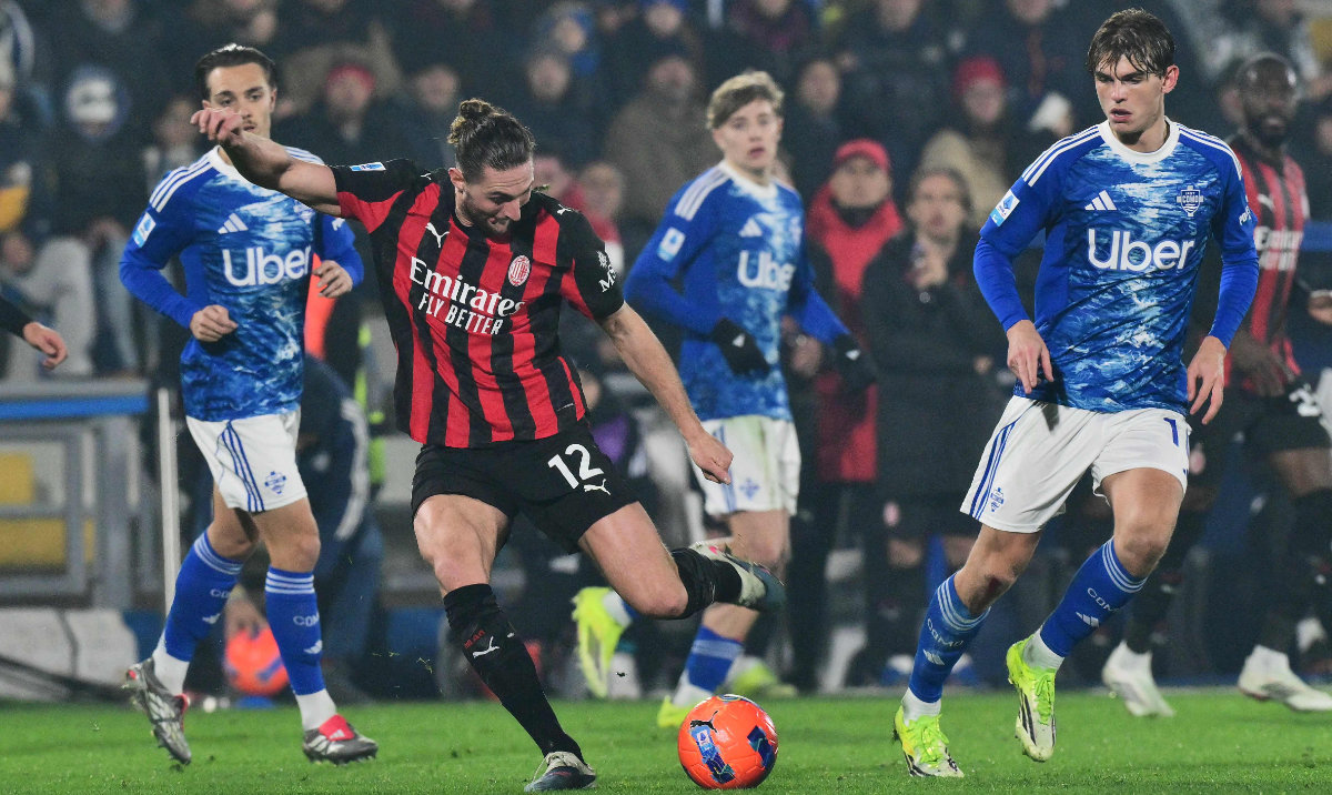 Rabiot double lifts Milan after early scare at Como
