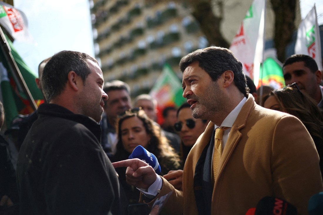 Andre Ventura, leader of Portugal's far-right political party Chega and Presidential candidate speaks to a supporter during a rally in Sobral de Monte Agraco, Portugal. (Reuters)