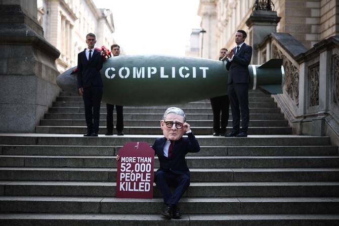 The UK government’s overtures toward unblocking arms licenses to Israel have been condemned by five major civil society groups. (AFP/File Photo)