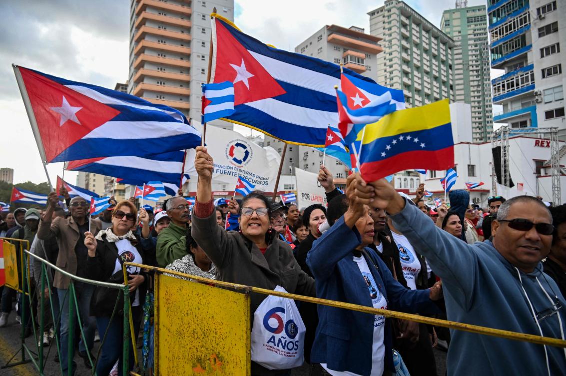 Cubans take part in the “Anti-Imperialist” protest in front of the US Embassy against the US incursion in Venezuela, where 32 Cuban soldiers lost their lives, in Havana on Jan. 16, 2026. (AFP)