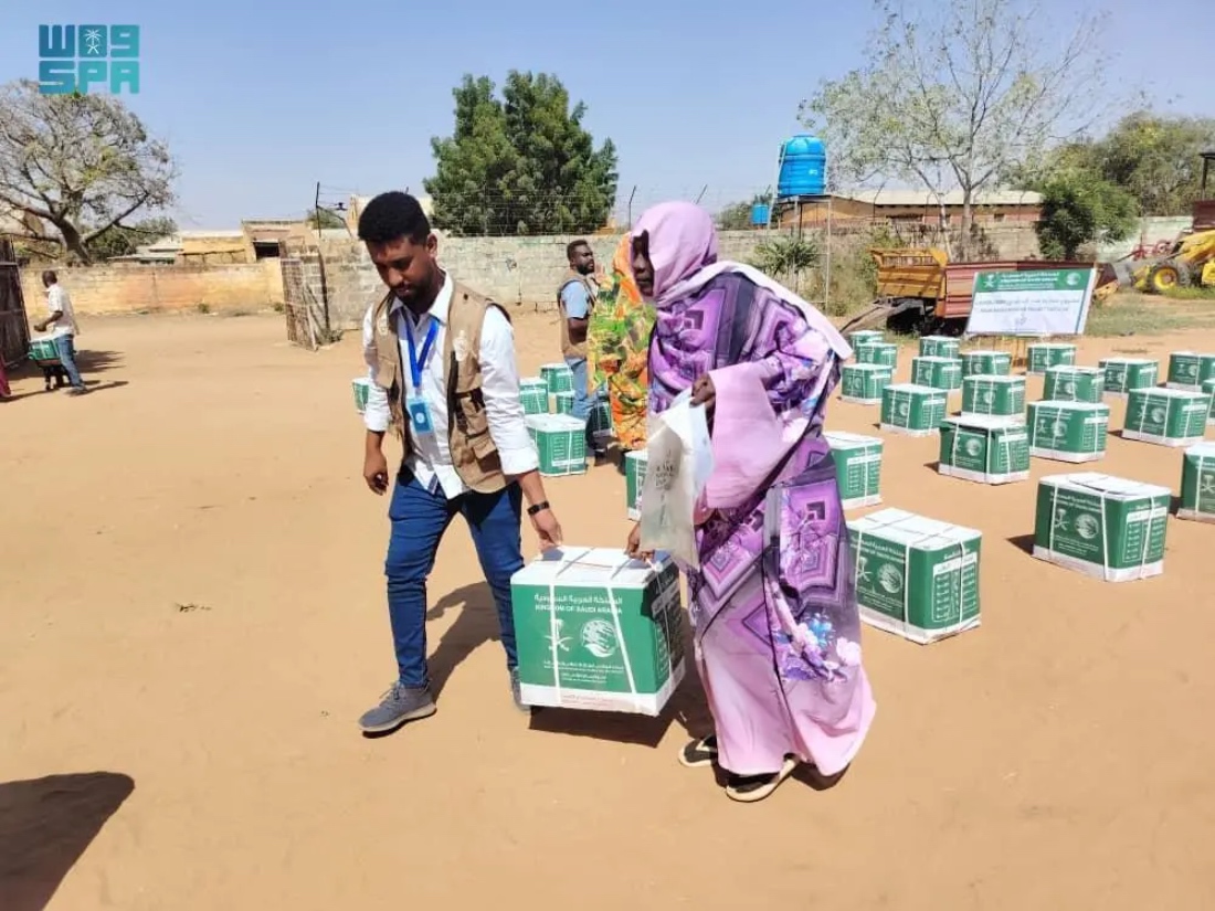 KSrelief worker seen distributing food baskets in Sudan. (SPA)