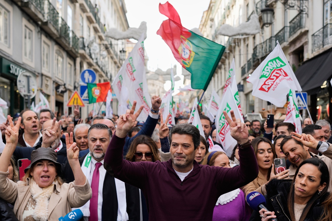 Presidential candidate Andre Ventura, of the populist Chega party, gestures to supporters while campaigning for Sunday's presidential election, in Lisbon, Portugal. (AP)
