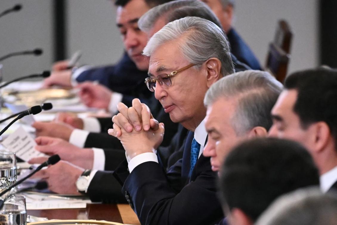 President of Kazakhstan Kassym-Jomart Tokayev listens during a dinner with US President Donald Trump and Central Asian leaders in the East Room of the White House in Washington, DC, on November 6, 2025. (Photo by Mandel NGAN / AFP)