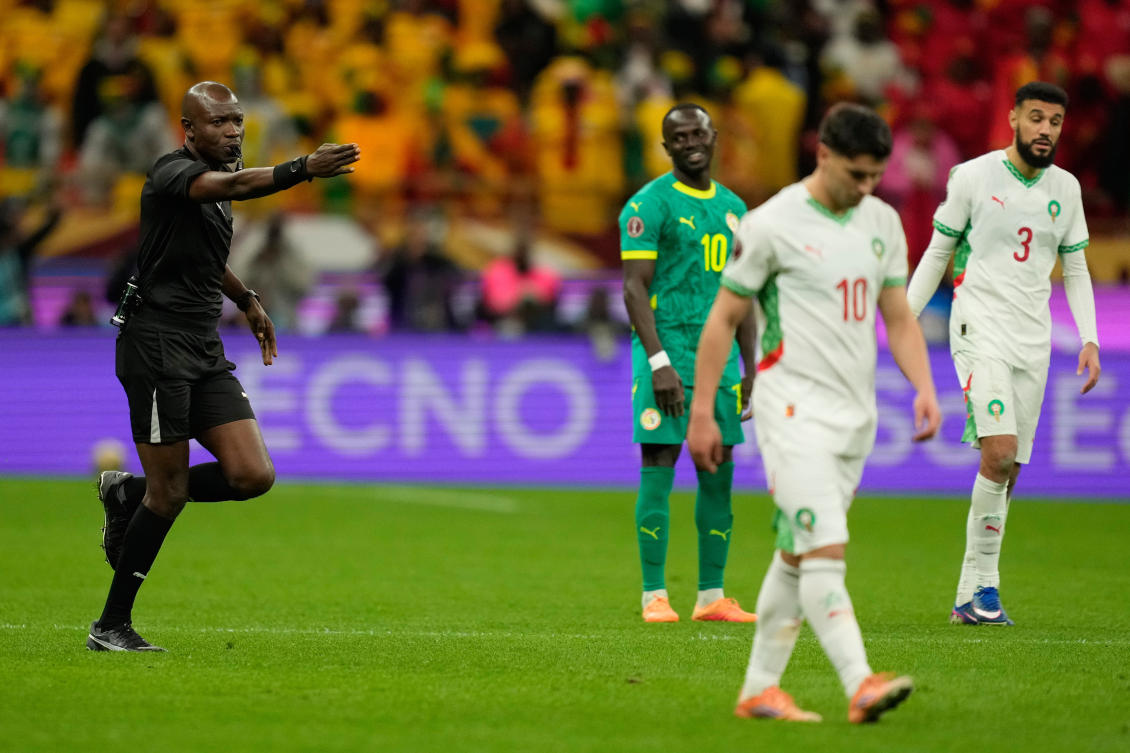 DR Congo’s referee Jean-Jacques Ndala calls a penalty after a review during the Africa Cup of Nations final between Senegal and Morocco, in Rabat, Morocco, Sunday, Jan. 18, 2026. (AP Photo)