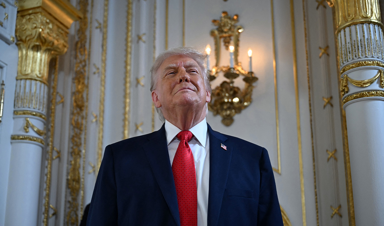 US President Donald Trump arrives to take part in a dedication ceremony for Southern Boulevard, in the ballroom at Mar-a-Lago in Palm Beach, Florida, on January 16, 2026. (AFP/ file)