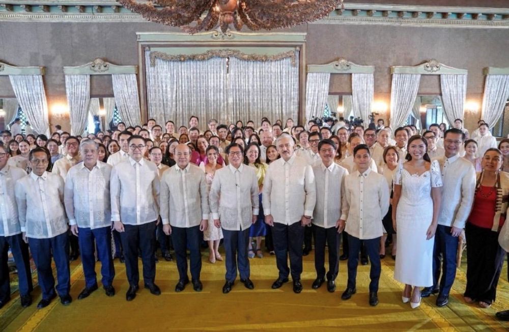 President Ferdinand Marcos Jr. and members of his administration pose in the Ceremonial Hall of Malacanang Palace, Jan. 5, 2026. (Presidential Communications Office)
