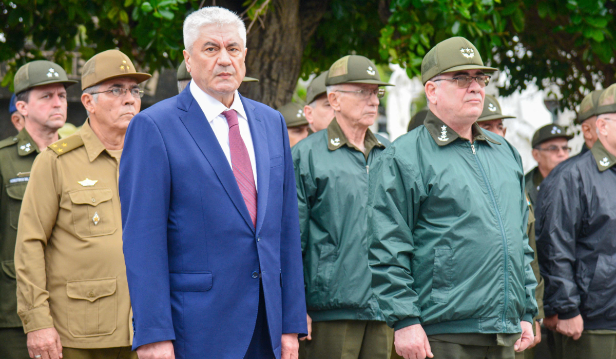 Russia's Interior Minister Vladimir Alexandrovich Kolokoltsev (L) paying tribute to Soviet internationalist soldiers by laying a floral offering at the mausoleum dedicated to these fighters as part of his visit agenda to Cuba, in Havana on January 20, 2026. (AFP)