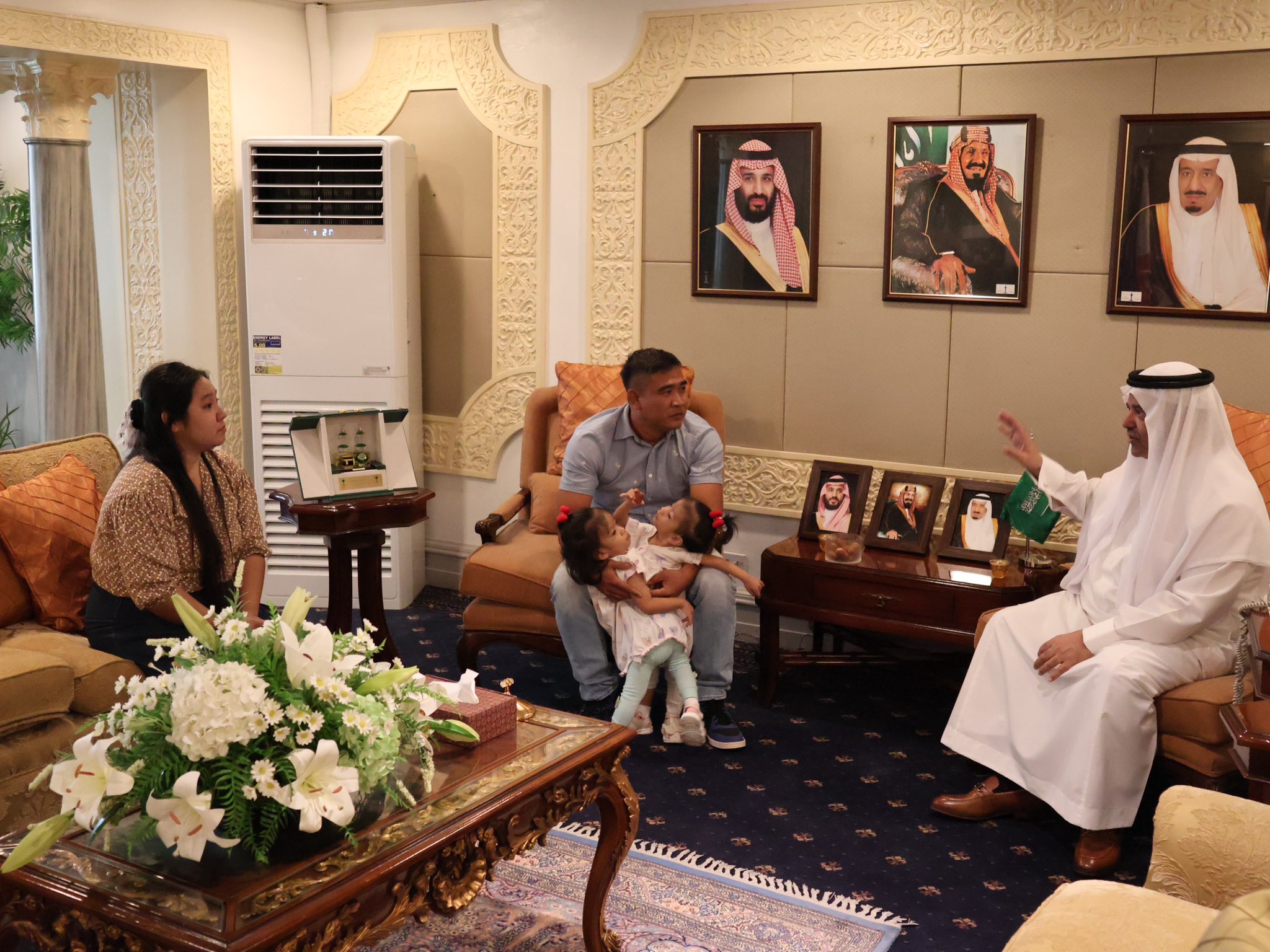 Olivia and Gianna Manuel, and their parents, meet Saudi Ambassador Faisal Ibrahim Al-Ghamdi at the Kingdom's embassy in Manila, on Dec.16, 2025. (Saudi Embassy in Manila)