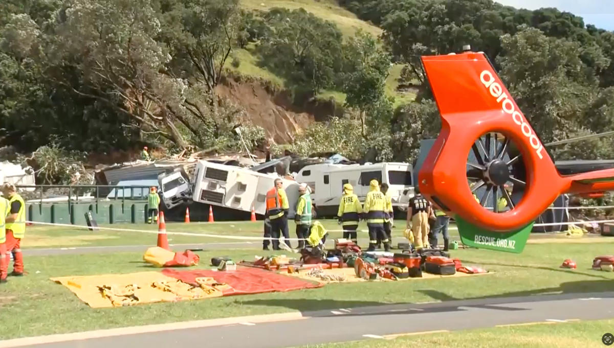 Emergency services were called to the slide at the base of Mount Maunganui, above, on New Zealand’s North Island after 9:30 a.m. (TVNZ via AP)