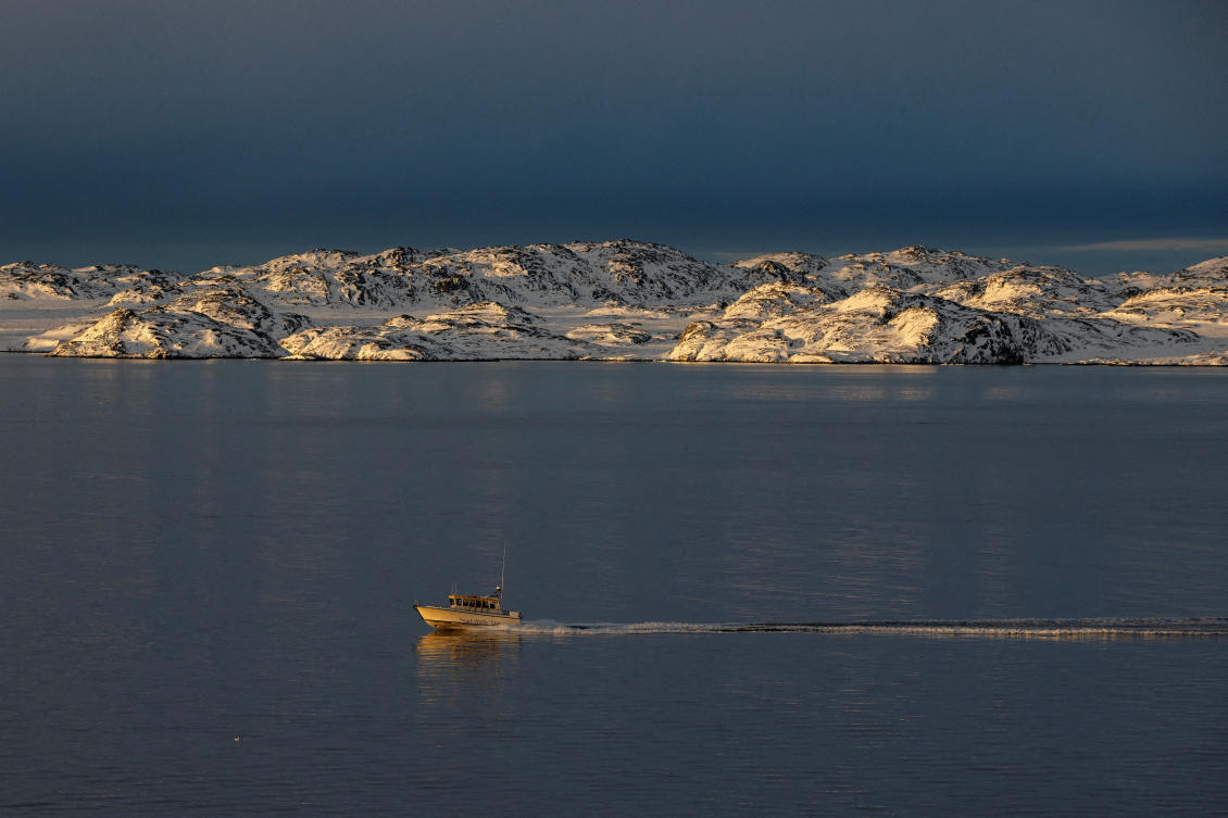 A ship sails on the day of the meeting between top US officials and the foreign ministers of Denmark and Greenland, in Nuuk, Greenland, January 14, 2026. (File/REUTERS)