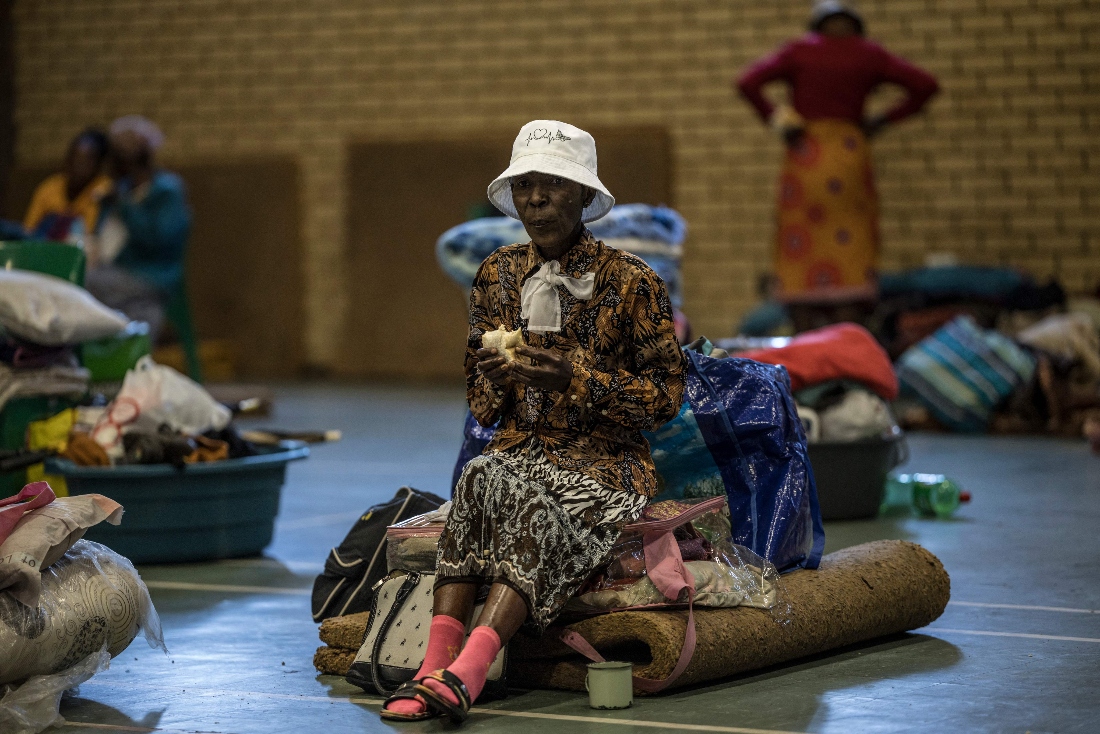 Maria Modikwa, 60, a displaced woman from the informal settlement of Sporong by the ongoing unrest between the community and a group of artisanal miners commonly referred to as "zama zamas" in Randfontein, South Africa. (AFP)