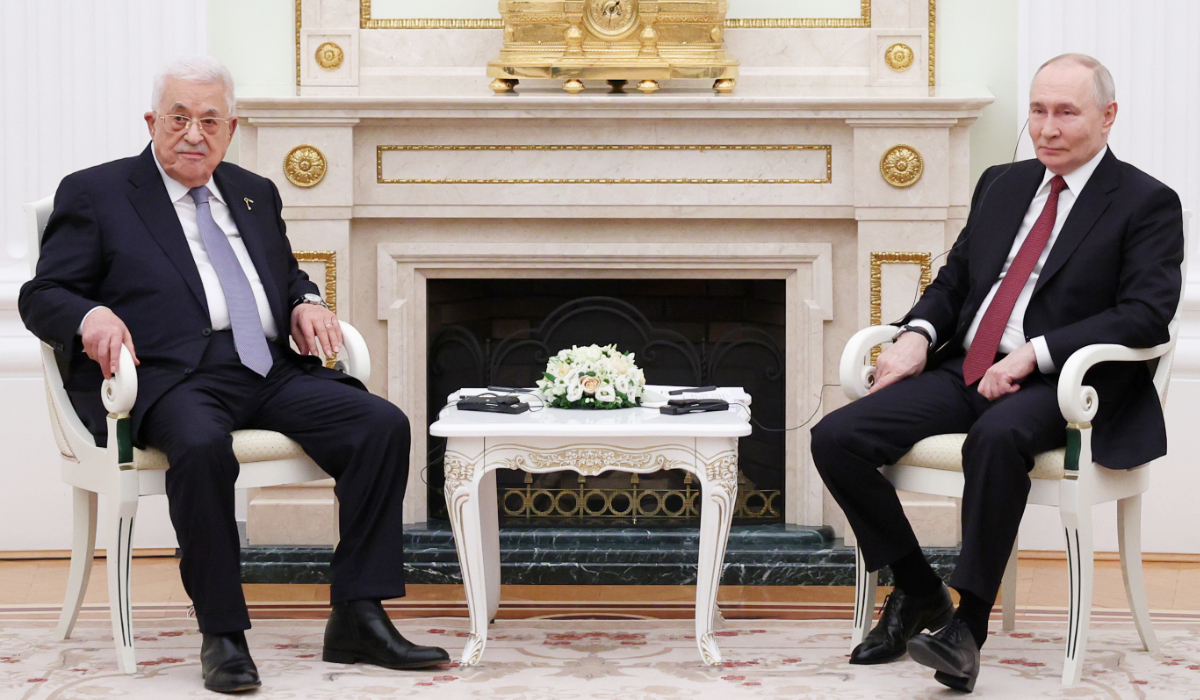 Russian President Vladimir Putin with Palestinian President Mahmoud Abbas at the Senate Palace of the Kremlin in Moscow. (AP)