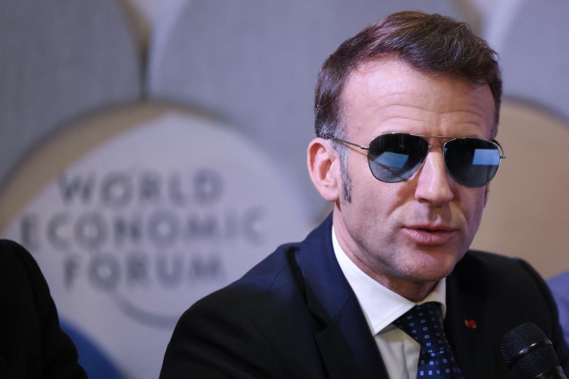 French President Emmanuel Macron’s sporting of aviator shades at Davos this week tickled the press and inspired viral memes online. (AFP)