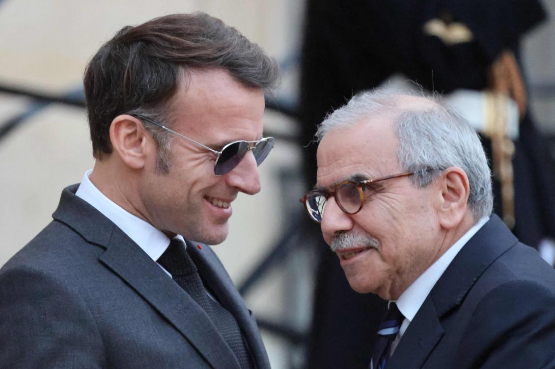 France’s President Emmanuel Macron shakes hands with Lebanon’s PM Nawaf Salam prior to their meeting at the Elysee presidential palace in Paris, on Jan. 23, 2026. (AFP)