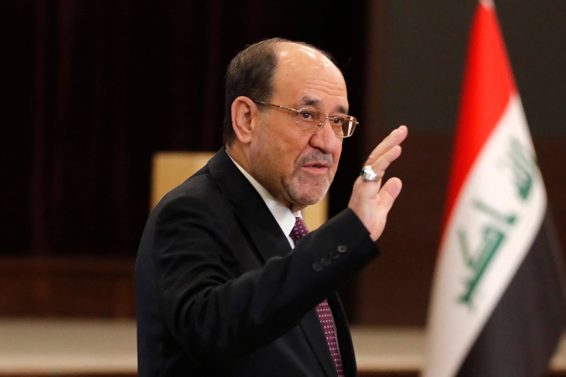 Former Iraqi Prime Minister Nouri al-Maliki leaves after casting his ballot at a polling station in Baghdad, Iraq. (AFP)