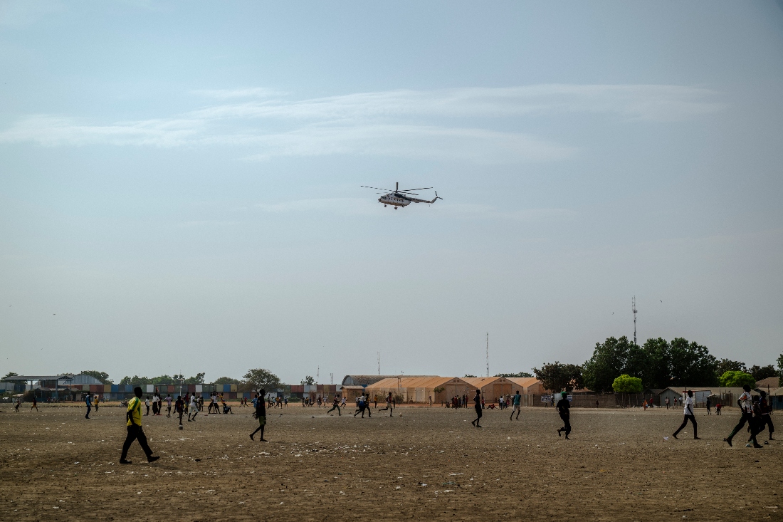 A photo dated November 2025 shows a UN helicopter performing a routine patrol over the Bentiu internally displaced persons camp in Unity State, South Sudan. (AFP)