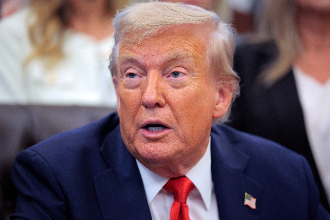 U.S. President Donald Trump speaks as he meets with family members of victims of the "Abbey Gate" terrorist attack in the Oval Office at the White House, US. (AFP)