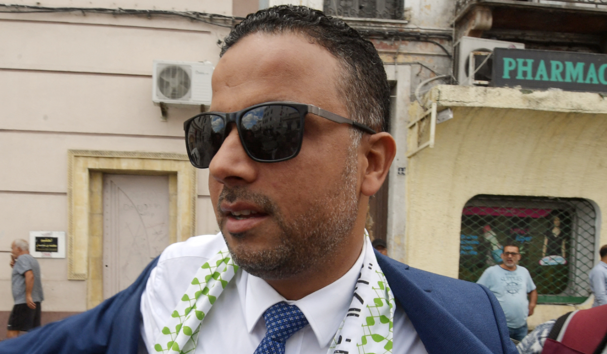 Seifeddine Makhlouf, a Islamist populist lawyer, arrives at a polling station in the capital Tunis on October 6, 2019, during the third round of legislative elections since the North African country's 2011 revolution. (AFP)