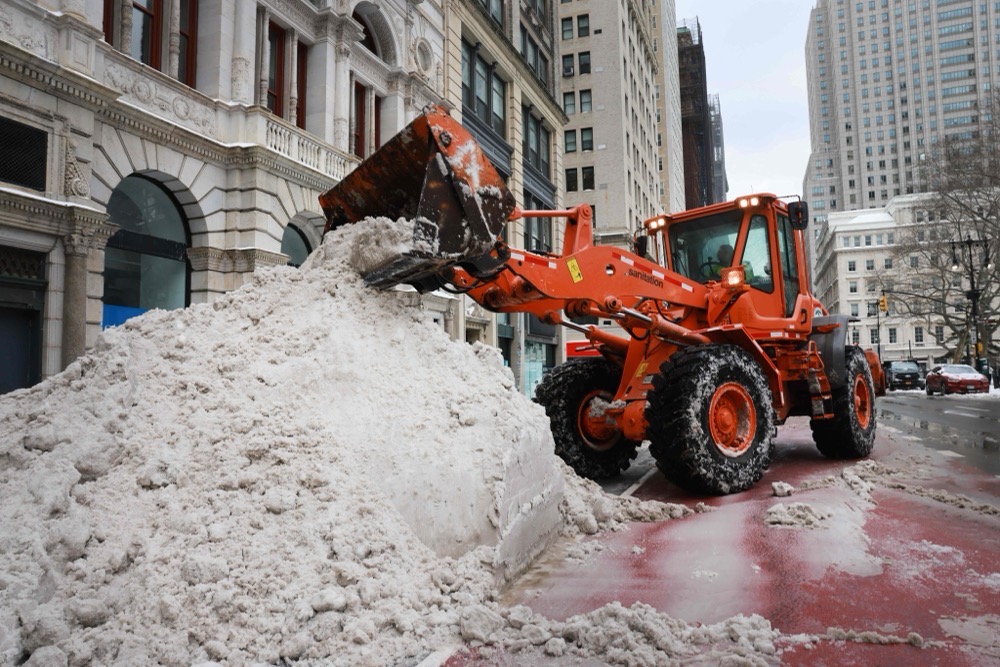 A plow moves snow outside of City Hall in Manhattan after a storm left nearly one foot of snow on January 26, 2026 in New York City. (Getty Images/AFP)