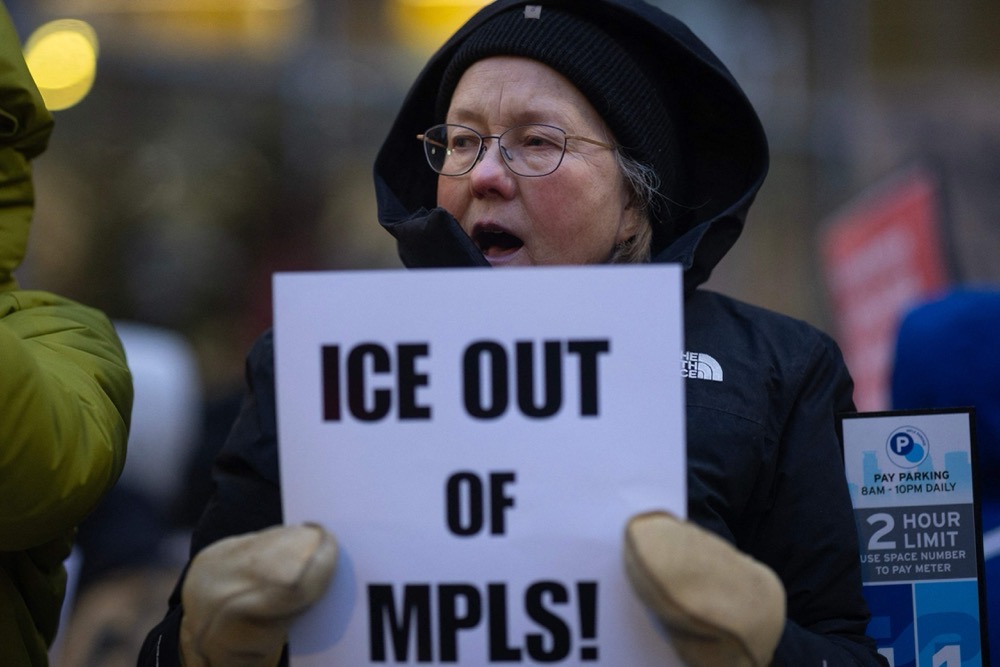 Demonstrators protest, calling for an end to ICE operations in Minnesota, outside the office of US Sen. Amy Klobuchar (D-MN) on January 26, 2026 in Minneapolis, Minnesota. (Getty Images/AFP)