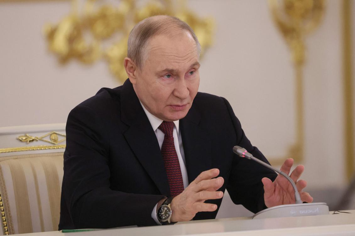 Russian President Vladimir Putin attends a meeting with the UAE President at the Kremlin in Moscow on Thursday. (AFP)