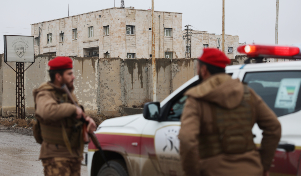 Syrian government forces stand guard in Raqqa, northeastern Syria, Jan. 23, 2026. (AP)