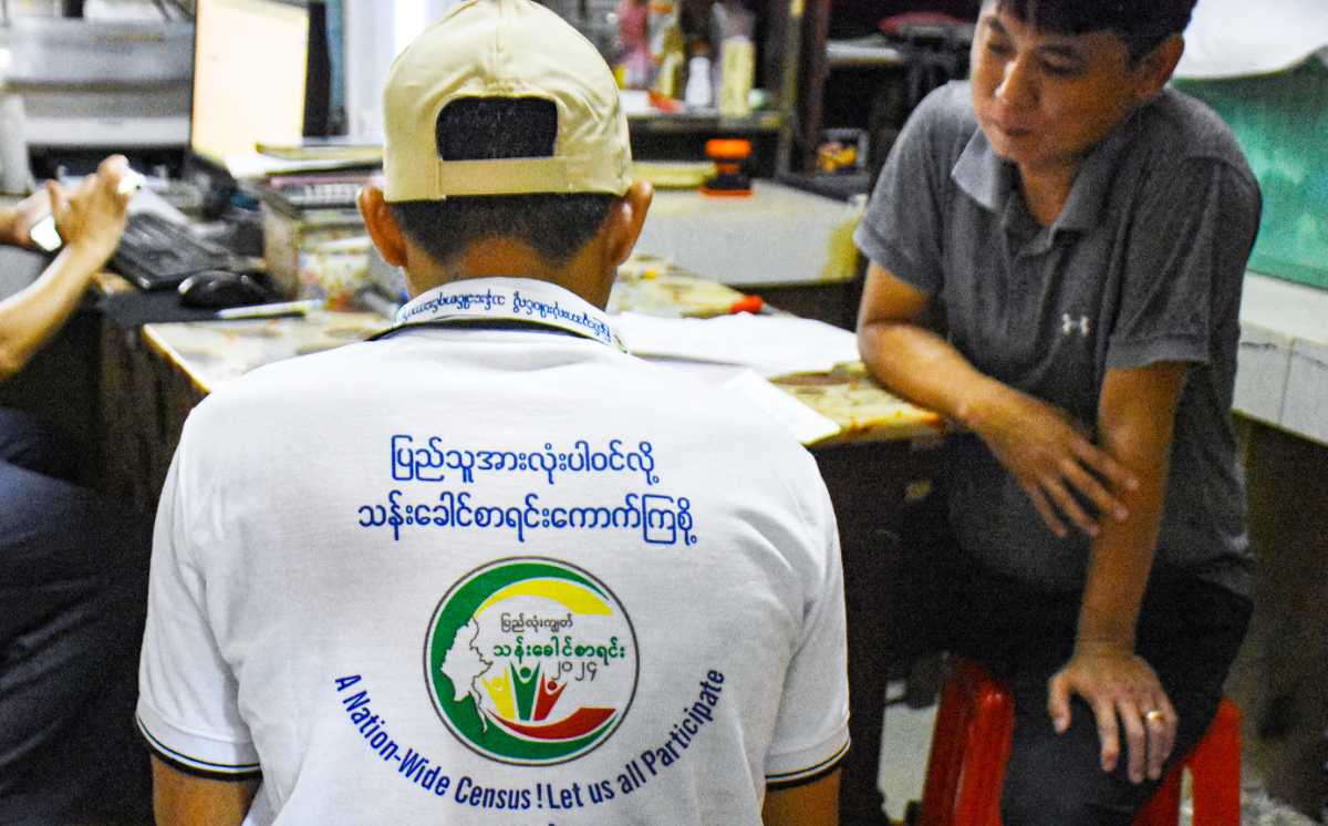 A census enumerator collects information during a national census in Naypyidaw on October 1, 2024. (AFP)