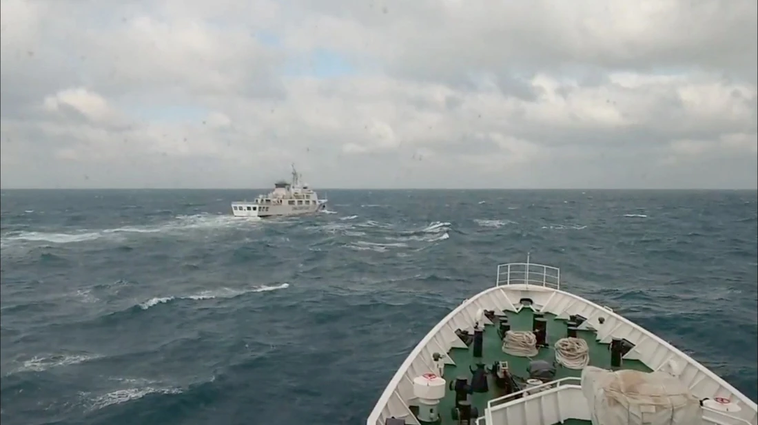 This handout photo released on December 30, 2025 by the Taiwan Coast Guard shows a Lienchiang-class vessel of the Taiwanese coast guard responding to a China Coast Guard ship in waters northwest of Huayu Island. (AFP)