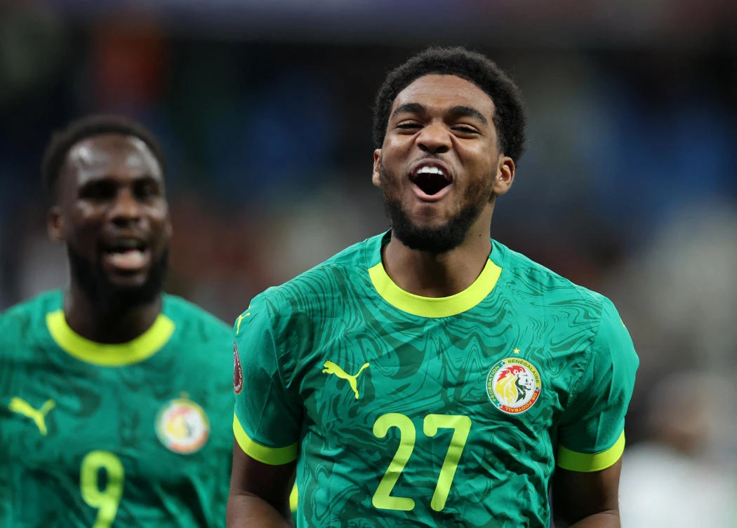 Senegal’s Ibrahim Mbaye celebrates scoring their third goal. (Reuters)