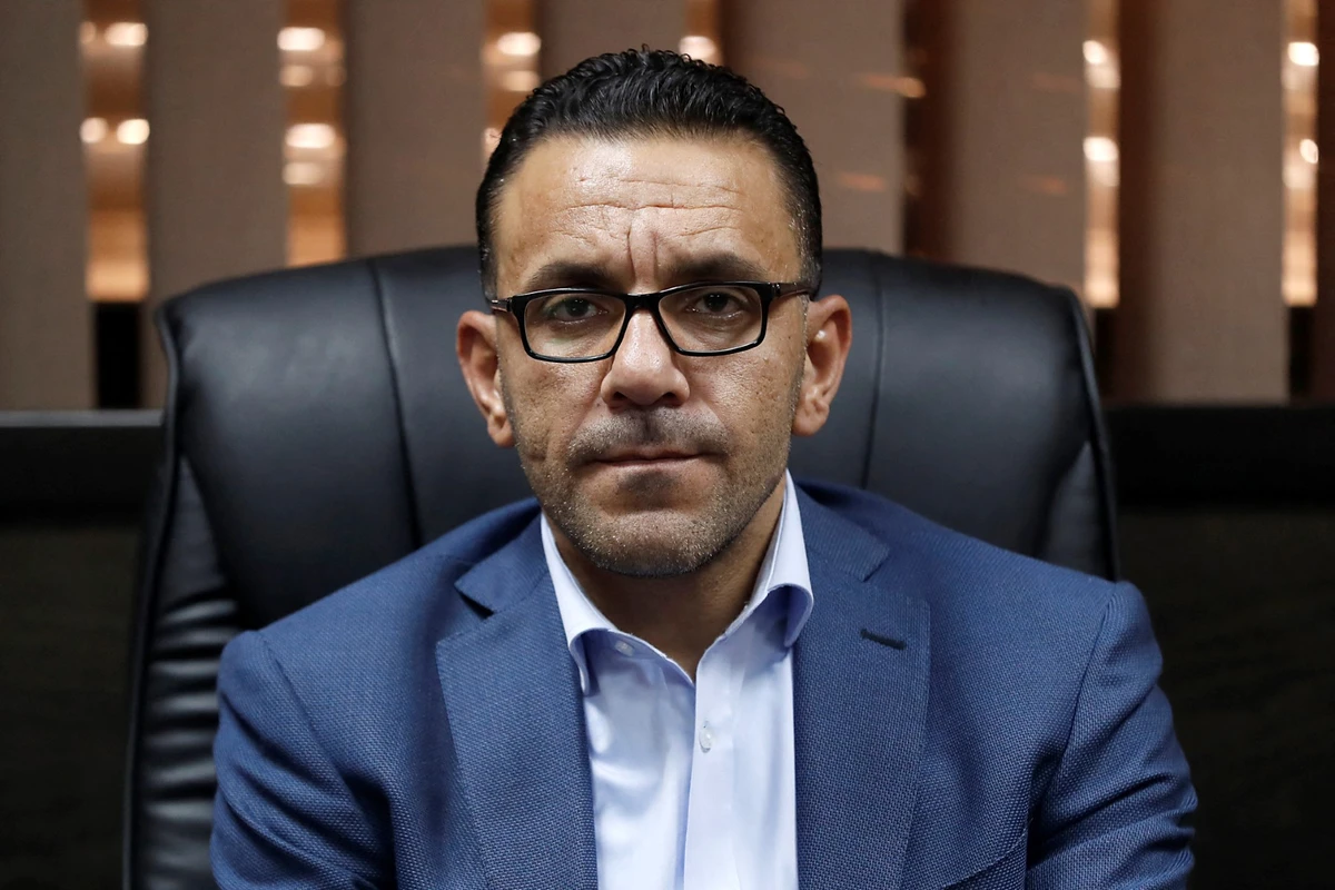 Governor of Jerusalem for the Palestinian Authority, Adnan Ghaith, poses for a photograph in his office at the Palestinian Ministry of Jerusalem Affairs’ headquarters in the occupied West Bank town of al-Ram, near Jerusalem. (File / AFP)