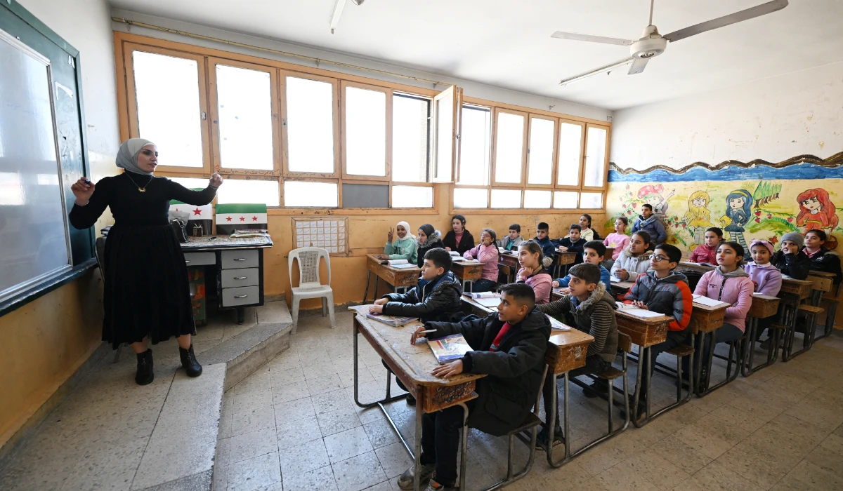 Syrian schoolchildren attend class at a school in the capital Damascus' Dweilaa neighbourhood on December 15, 2024. (AFP)